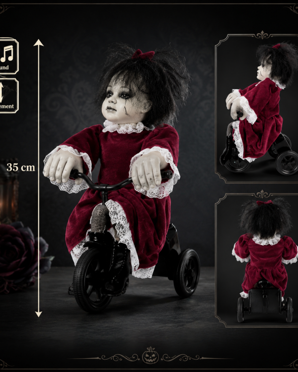 Poupée sur Tricycle